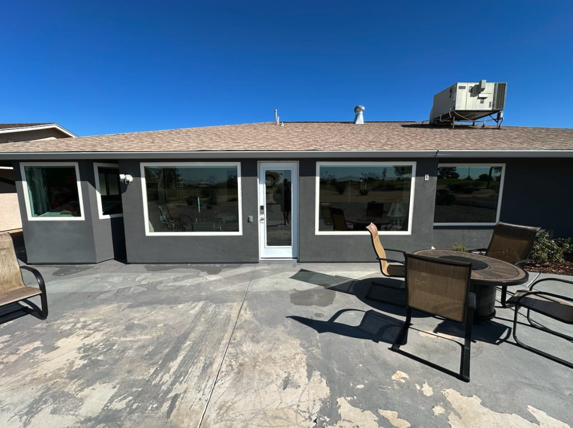 Backyard windows cleaned on a single-story Lomita home